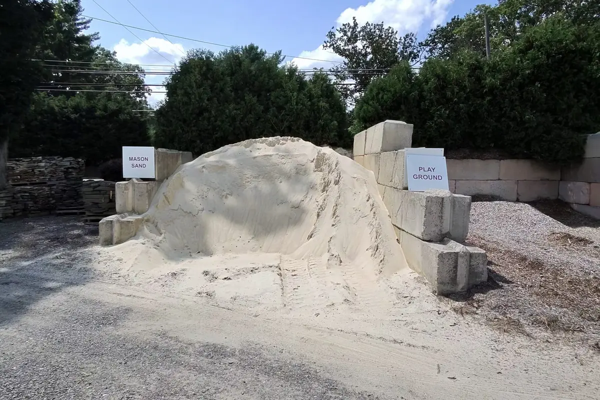 Bulk sand pile in a block bin at the A.Z. supply yard